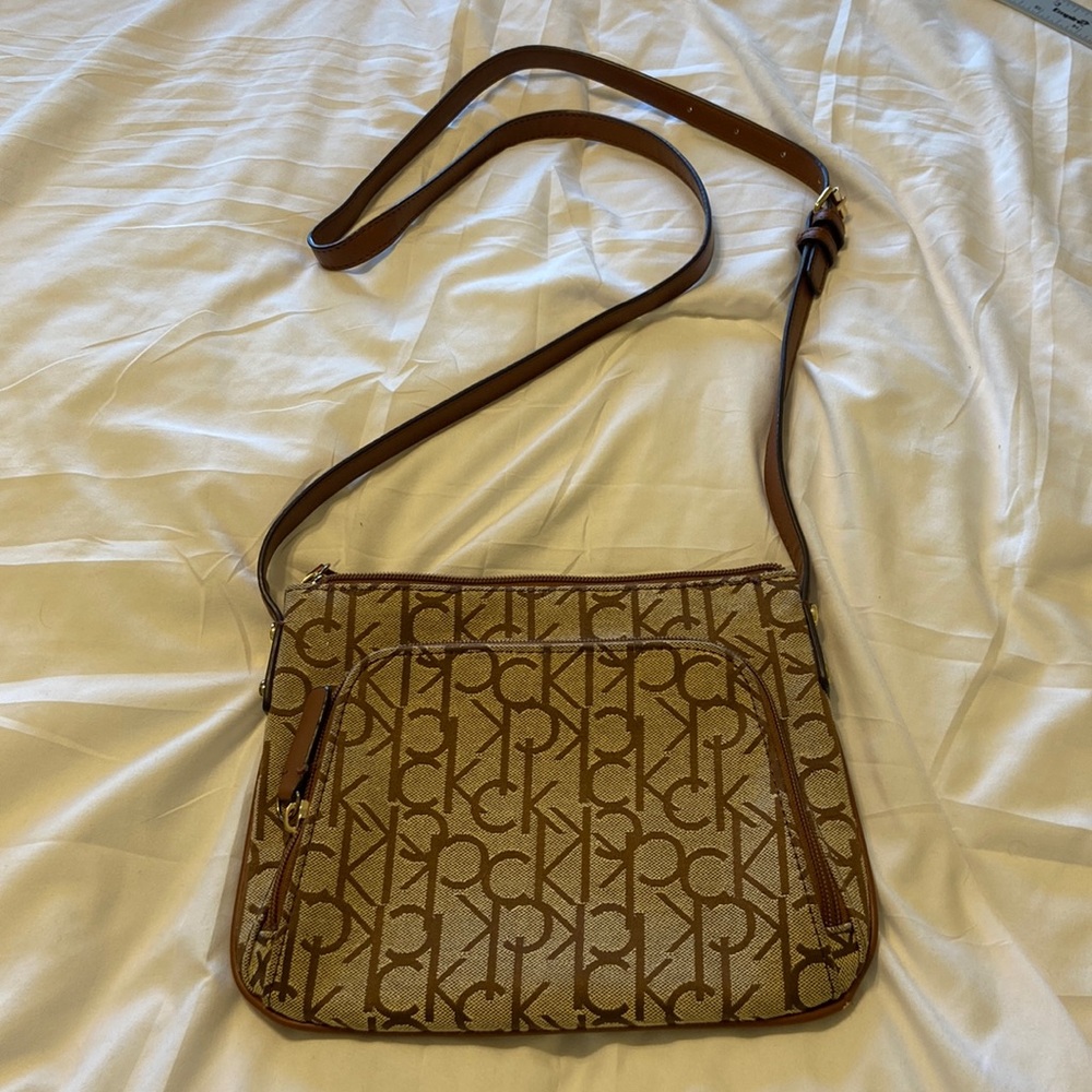 Calvin Klein Cross body Cavas Leather gold hardware gently pre loved great bag